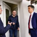 Ed Miliband MP and Mayor Andy Abrahams talking to homeowner, John Greatorex, in Mansfield about work he has had done to help cut down his energy bills