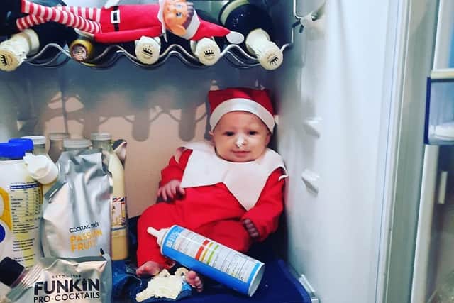 The three-month-old seems perfectly at ease in front of the camera.