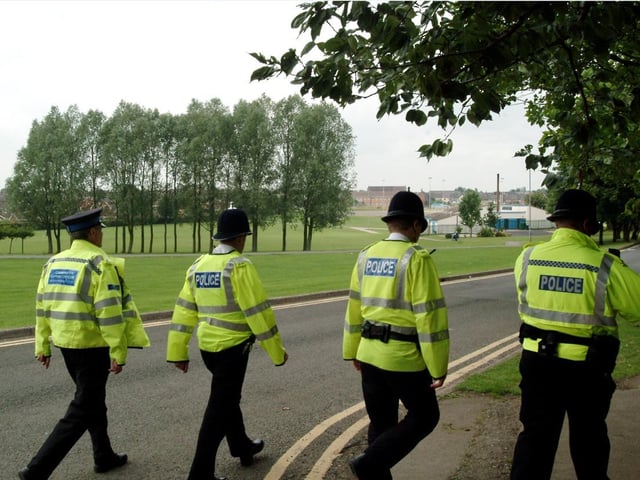 Police officers at Sutton Lawn in 2005.
