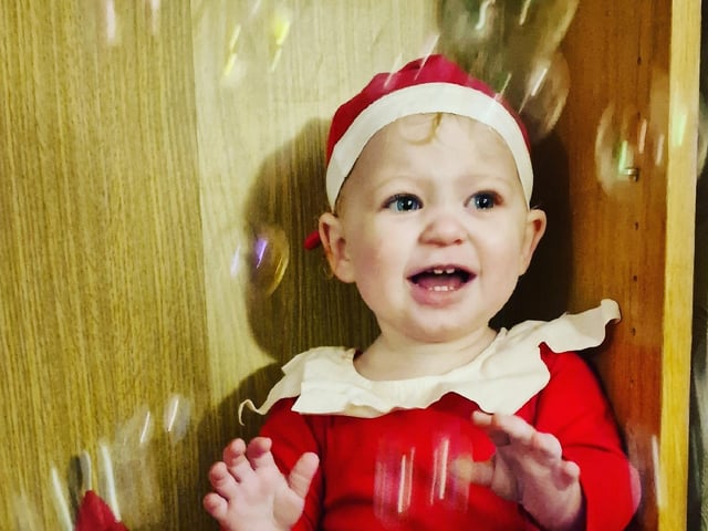 Bubbles the Elf and the traditonal Elf on the Shelf have some fun with bubbles