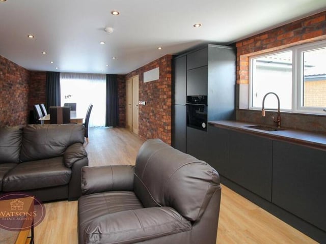 The annexe can be put to multiple uses, including as a holiday home for rental. It comes complete with an open-plan living space and contemporary kitchen.
