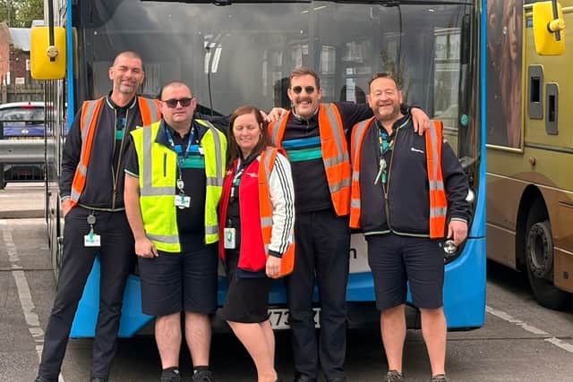 James Bell (centre right) and members of the Stagecoach team aiming to do an extra 50m steps.