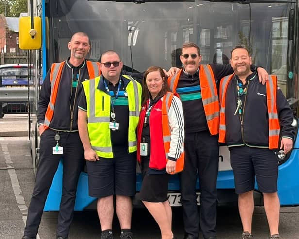 James Bell (centre right) and members of the Stagecoach team aiming to do an extra 50m steps.
