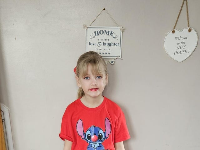 Lexi-Marie, 8, is all in red.