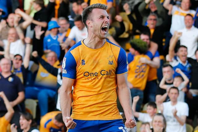 Mansfield Town forward Rhys Oates celebrates a goal in the semi-final with Northampton.