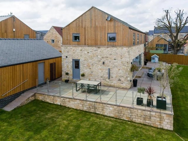 Larchwood House sits well within its sizeable plot and provides a lovely wrap-around garden to the side and rear that benefits from an extensive seating terrace with glazed balustrading. The seating terrace is well connected to the dining kitchen through sliding doors, making it an ideal space for entertaining in the summer months. Within the driveway of the property, there is ample off-road parking and a detached double garage with a storage room.