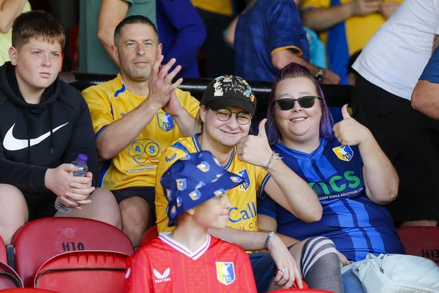Mansfield Town fans watch the 1-1 draw at Grimsby in League Two.