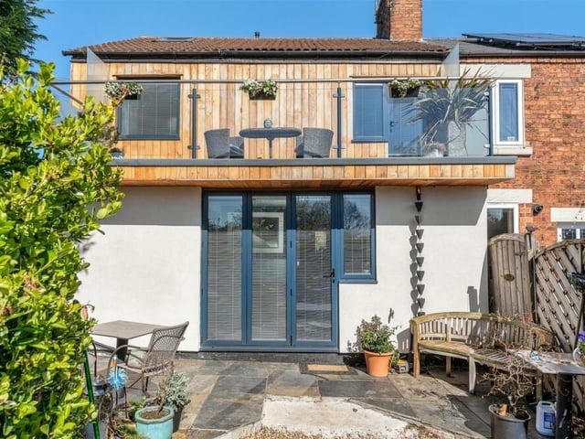 We close our photo gallery of Lea Cottage with this farewell shot of the bedroom balcony, above the bi-folding doors that lead into the garden from the kitchen.
