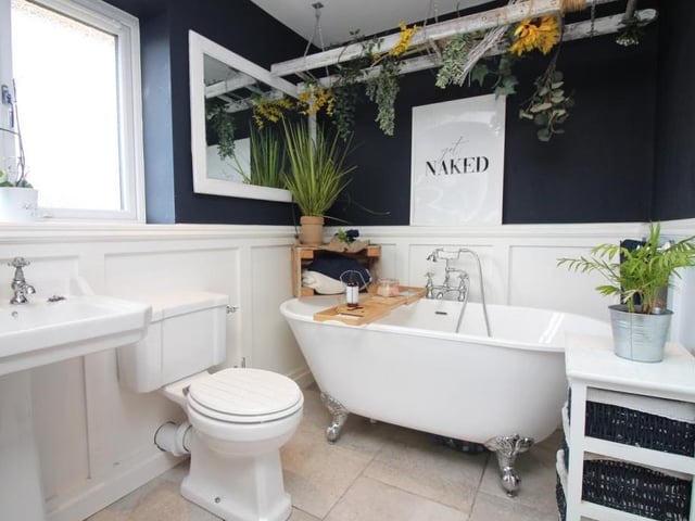 The family bathroom, also on the first floor, is a bit of a showstopper. A three-piece suite in white comprises a free-standing bath tub, pedestal sink unit and WC. There are also a heated towel-rail, ceiling spotlights and an airing cupboard housing a combination boiler.