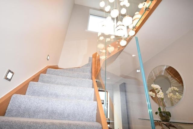 And up we go.....via the glass bespoke staircase, presented to the highest standard.