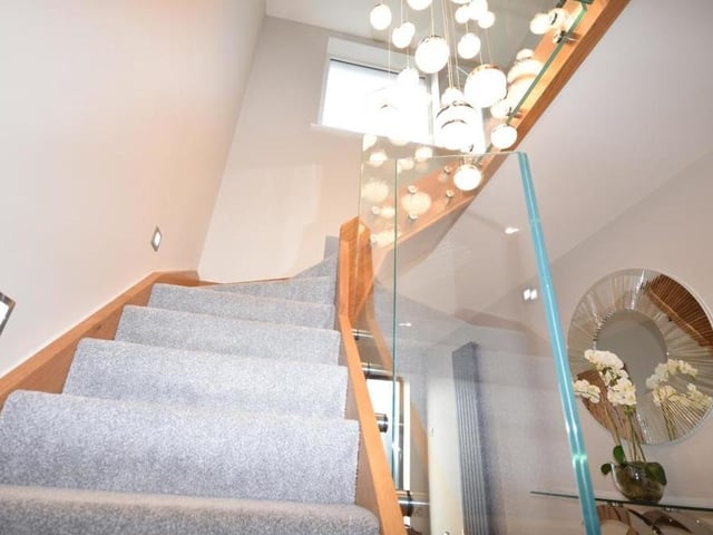 And up we go.....via the glass bespoke staircase, presented to the highest standard.