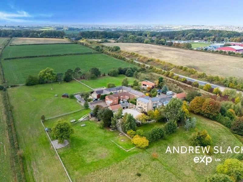 The Farmhouse stands within approximately one acre of private, gated grounds.
