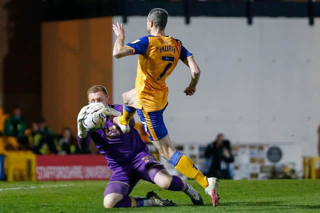 Jamie Murphy's shot is saved by Port Vale goalkeeper Aidan Stone.  Photo by: Chris Holloway/The Bigger Picture.media