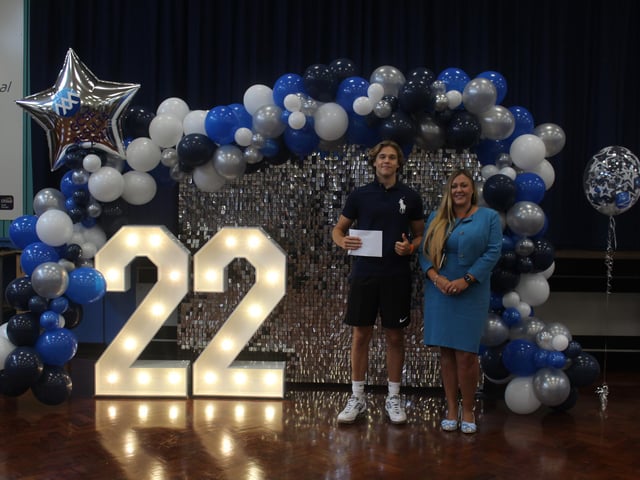 Sonny Walters who achieved seven grade 9’s, one grade 7 and one grade 6 with headteacher Katrina Kerry