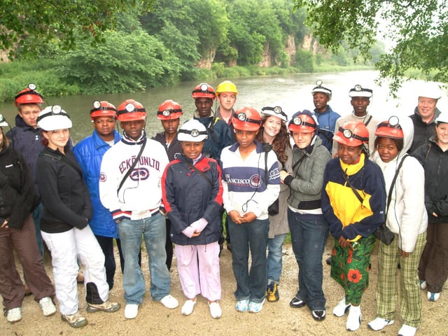 Creswell Crags, Creswell. Tanzania exchange students visited the area as part of partnership with Kiveton Youth and Community centre. Picture: Tanzania exchange students with visitors centre staff.