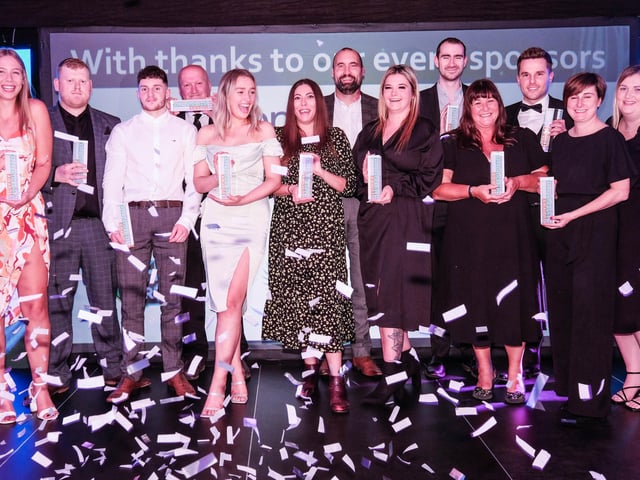 All the winners on stage with their trophies at the end of the night