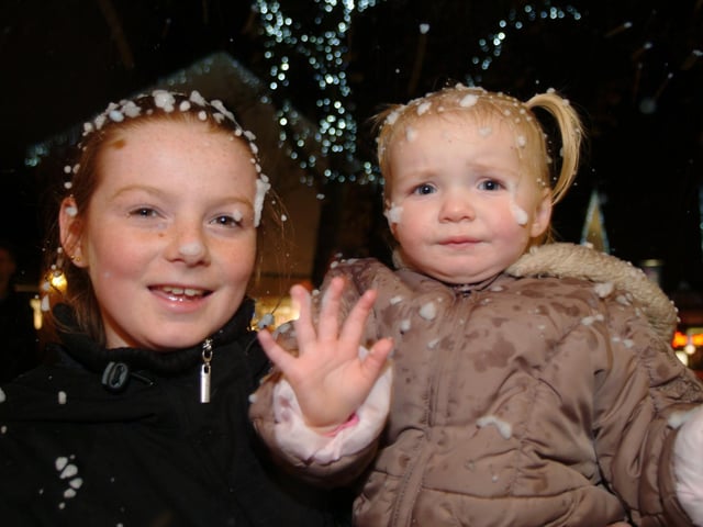 The East Midlands Designer Outlet celebrated the start of their run down to Christmas 2006 with a snow shower. Pictured is Jade Shaw aged 11 and her sister.