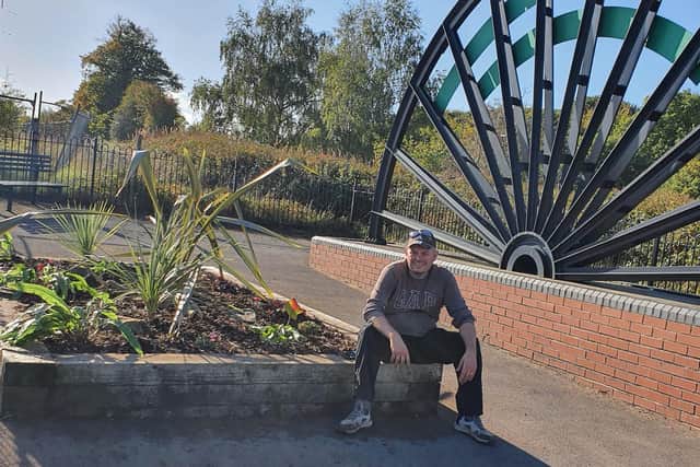 Simon Hollis resting after spending four days tidying up the memorial off Sherwood Rise, Mansfield Woodhouse.