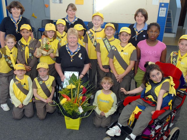 Members of the 105th City of Nottingham Brownies celebrate Brenda Blunt's, seated 50 years service to the Guiding in 2008