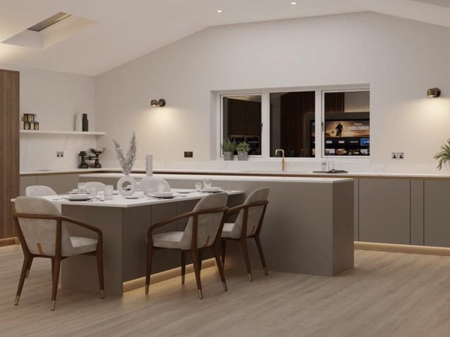 Our tour of the Hucknall bungalow begins in the impressive, open-plan dining kitchen.