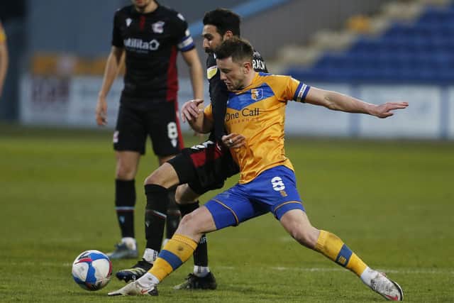 Ollie Clarke in action against Scunthorpe on Tuesday night. Photo: Craig Brough.