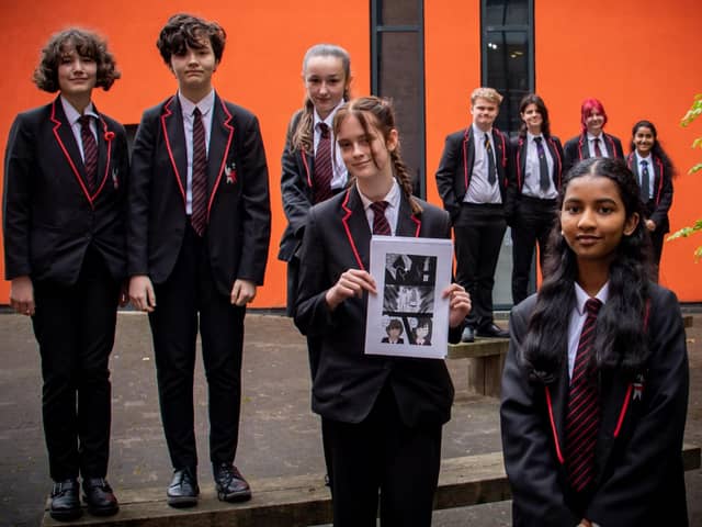 Youngsters at Samworth Church Academy in Mansfield with the e-zine they have produced, charting their experiences during lockdown.