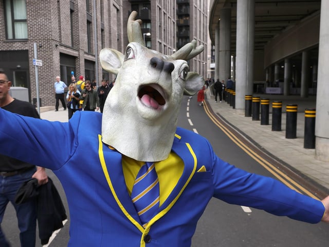 Mansfield Town fans soak up the Wembley atmosphere.