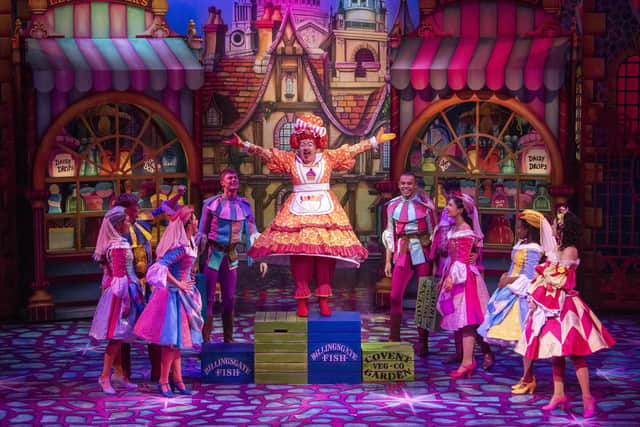 Iain Stuart Robertson holds court as Sarah The Cook in Dick Whittington at the Theatre Royal. Photo: Tracey Whitefoot