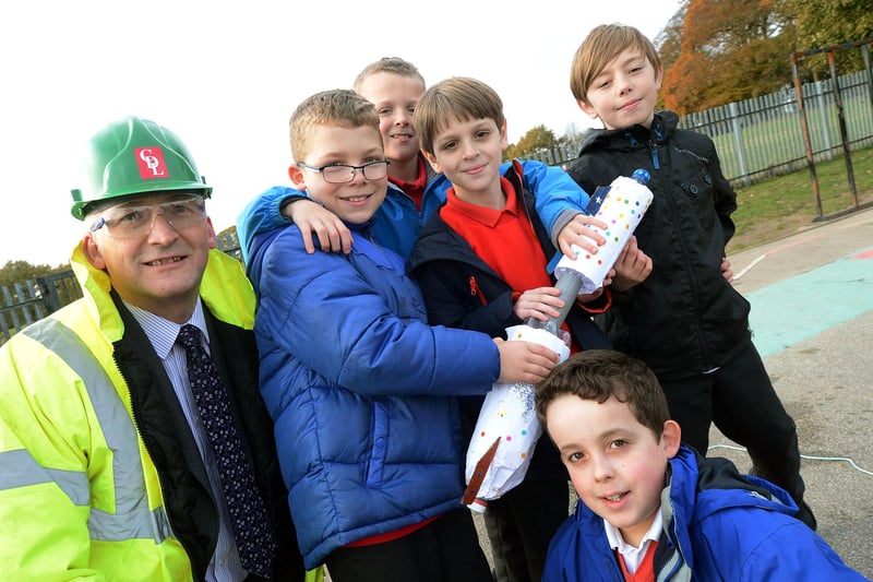 Engineer Gary Turner with pupils Jacob Beere, Bobby Edwards, Mohamed Elameri, Joshua Clark and Pacey Brennan pose with their bottle rocket which they made as part of their space topic at the Berry Hill Primary School.