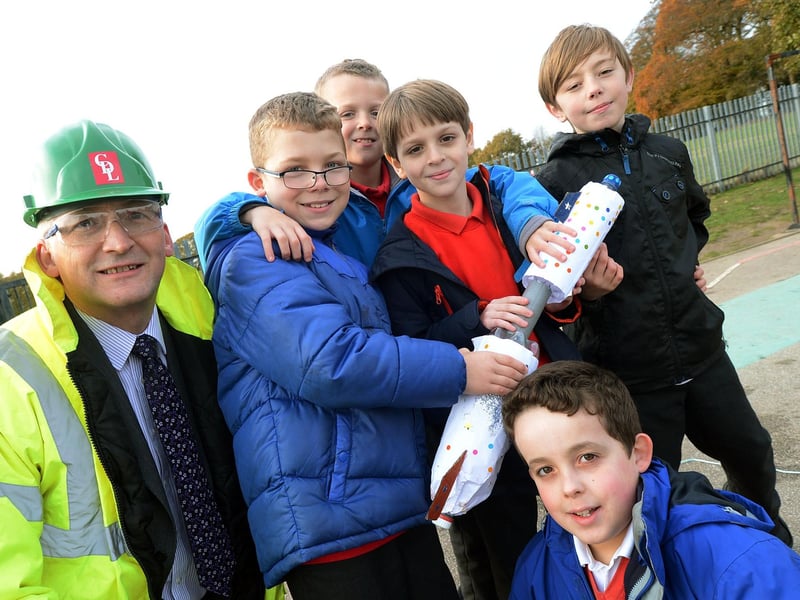 Engineer Gary Turner with pupils Jacob Beere, Bobby Edwards, Mohamed Elameri, Joshua Clark and Pacey Brennan pose with their bottle rocket which they made as part of their space topic at the Berry Hill Primary School.