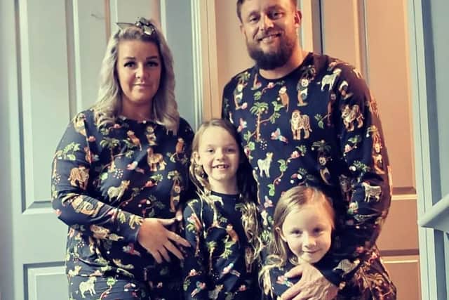 Gemma and her partner Rob, with their two daughters.