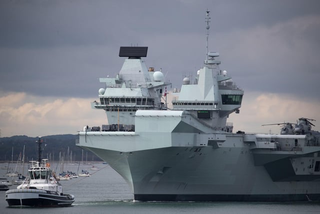 The Royal Navy aircraft carrier HMS Queen Elizabeth leaves Portsmouth. Picture: Andrew Matthews/PA Wire
