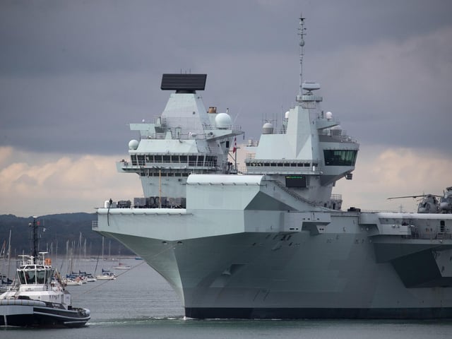 The Royal Navy aircraft carrier HMS Queen Elizabeth leaves Portsmouth. Picture: Andrew Matthews/PA Wire