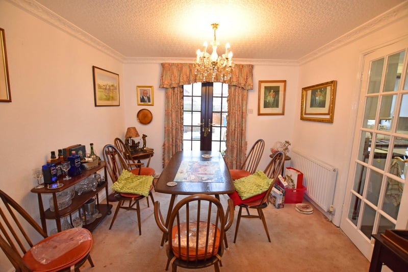 The dining room can be accessed from the lounge and kitchen and has double doors opening on to the outside patio area.