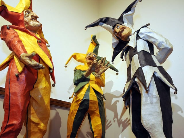 Jesters share a joke as part of Phillip Cox papier mache sculpture exhibition at the Mansfield Museum.