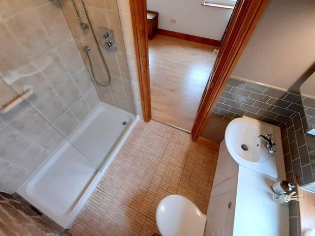 A unusual overhead shot of the en suite to the main bedroom.