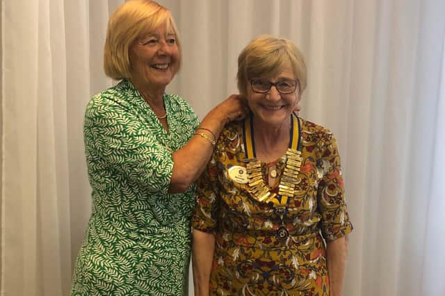 President of Sutton in Ashfield Inner Wheel Club Lin Maloney being presented with her Chain of Office by last year's president Joan Broughton.
