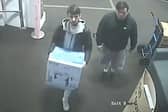 Police want to speak to these two men after a printer was stolen from a shop in Mansfield. Photo: Nottinghamshire Police