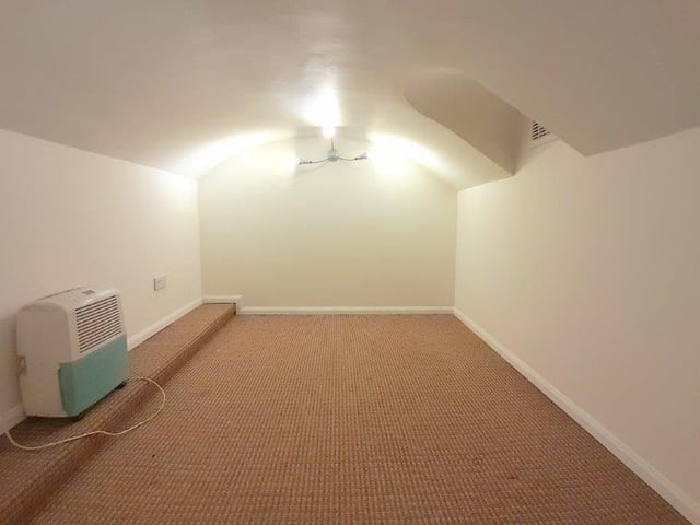 Any number of uses could be found for this tanked cellar at the Church Street cottage.