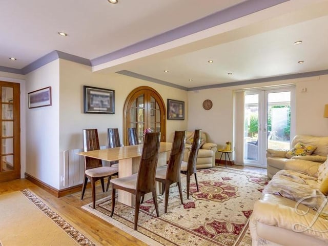The dining room from a different angle. It has access to the kitchen, living room and hallway but, most importantly, a set of French doors lead to the rear garden.