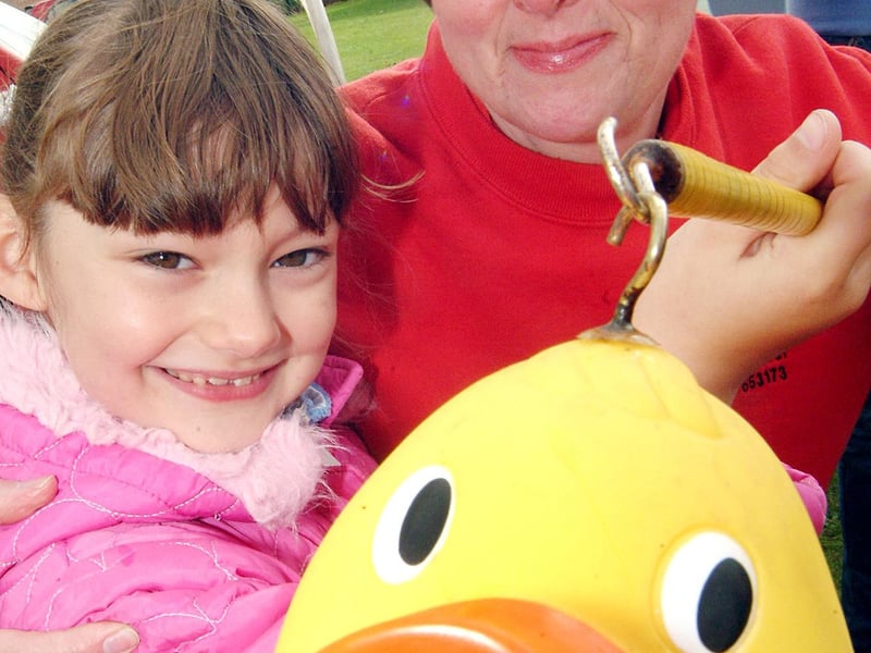 Mansfield Woodhouse's mardi gras back in 2007. Here is Jennifer Horner, aged seven at the time, hooking herself a duck on the Pet Bereavement stall run by Yvette Price-Mear.