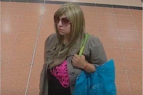 Police investigating the theft of a large sum of money have released an image of a woman they would like to speak with. (Photo by: Nottinghamshire Police)