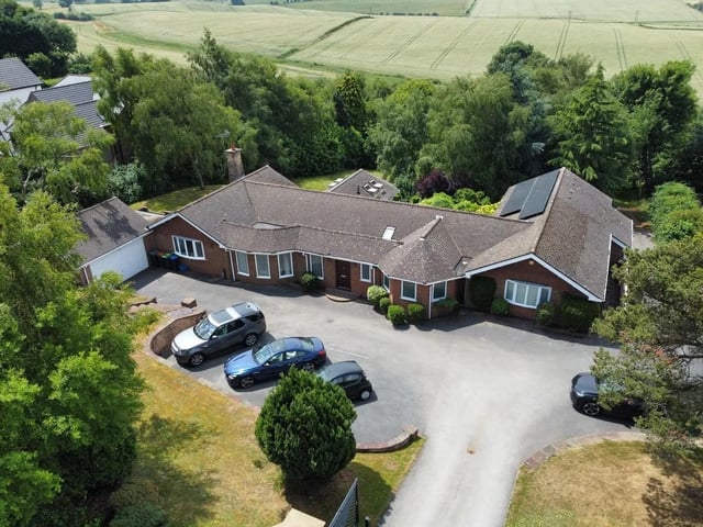 Impressive and extensive detached bungalow with countryside views set in 1 acre of gardens with an additional 2.73 acre paddock to the rear. Impressively positioned on Coxmoor Road overlooking stunning countryside views, this extensive 4-bedroom detached bungalow offers a rare opportunity for a tranquil and luxurious lifestyle.