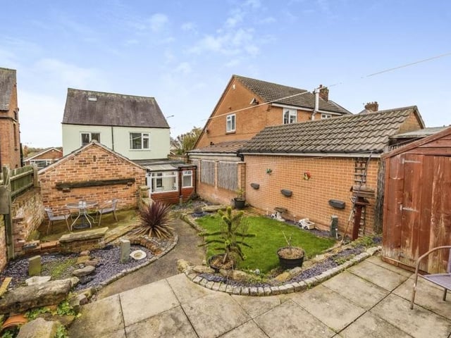 A view from the back of the house, showing the characterful garden and all its features.