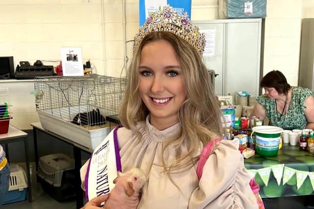 Nikita at an open day for Alfreton fire station, one of her first public appearances after winning the title. She is holding a hamster belonging to an animal shelter that had a stall at the event.