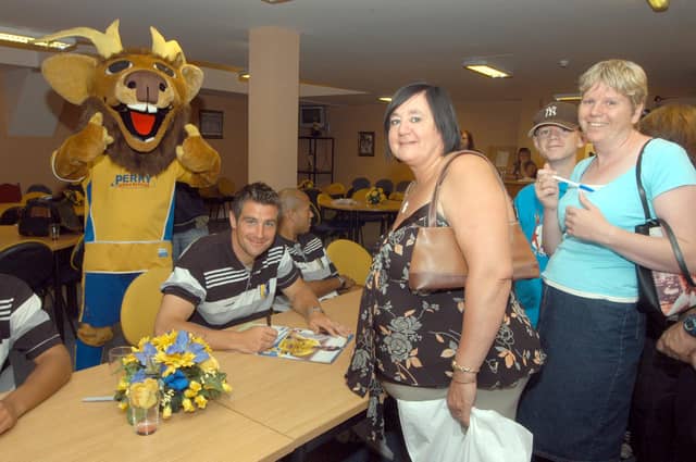 Stags skipper and fan's favourite Richie Barker signs autographs for fans at the open day held at Field Mill in 2006