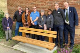 Friends and colleagues of Brian and Neil unveil the memorial bench at Stanton Hill.