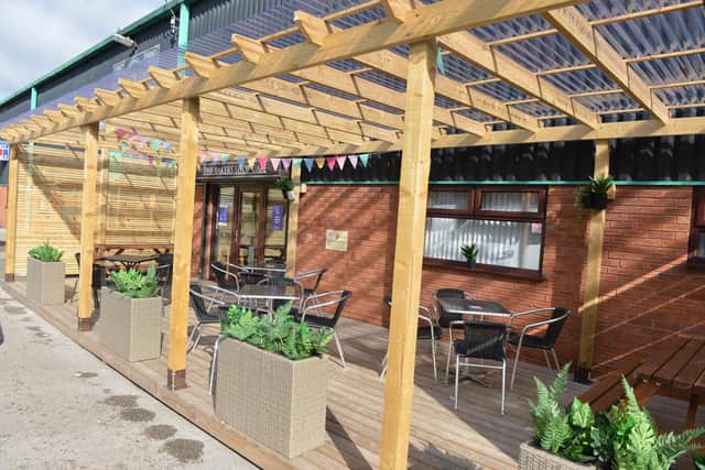 The outdoor seating area and decking at The Bakers Shop Cafe in Mansfield.