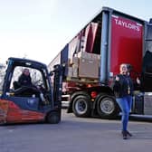 Taylors transport in Huthwaite are sending a lorry with goods for Ukraine. Seen AlanTaylor MD, Bogusia Kavanagh and driver Mark Taylor.                               