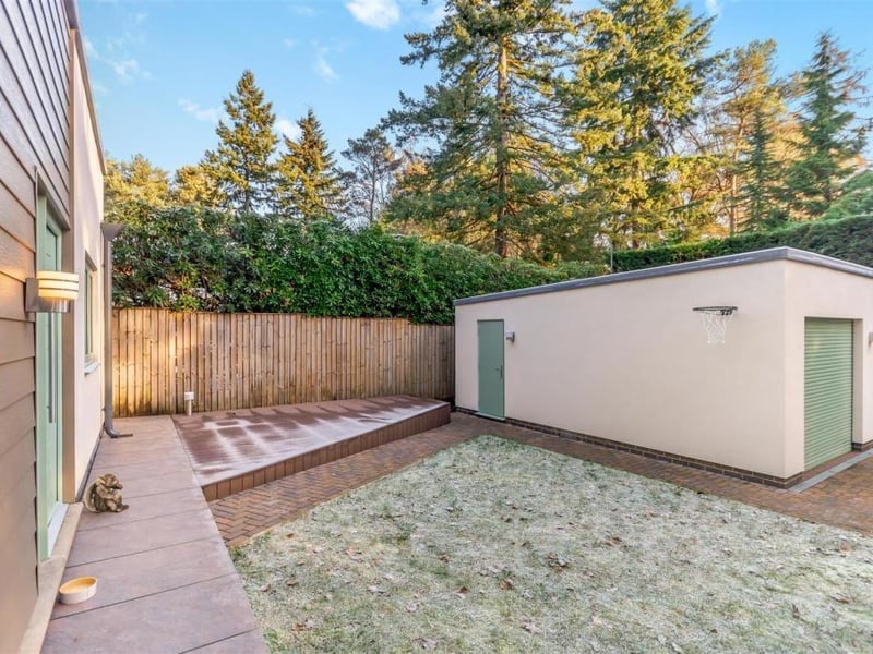 A substantial detached double garage sits next to the Newstead Abbey Park property, adding value.